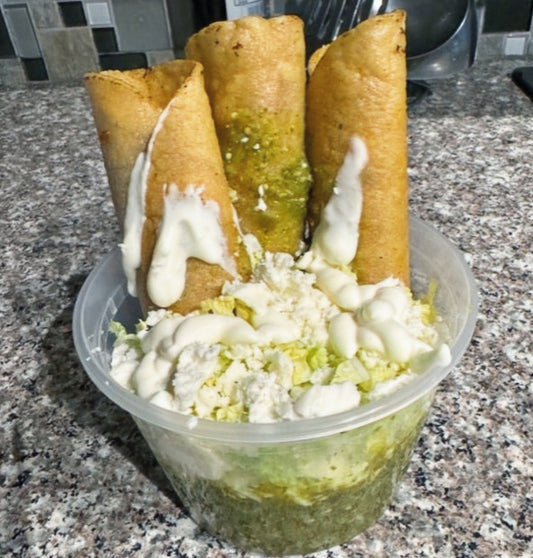 Smoked chicken flautas ahogadas