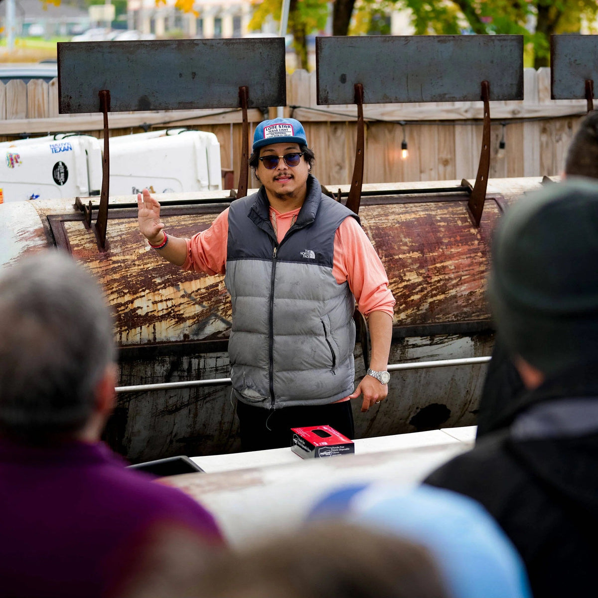 Joe Zavala teaching a BBQ class at the smoker
